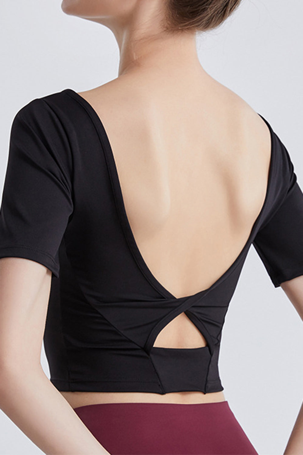 Cutout Backless Round Neck Active T-Shirt  Trendsi   