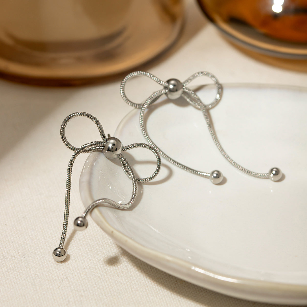 Stainless Steel Bow Earrings  Trendsi   