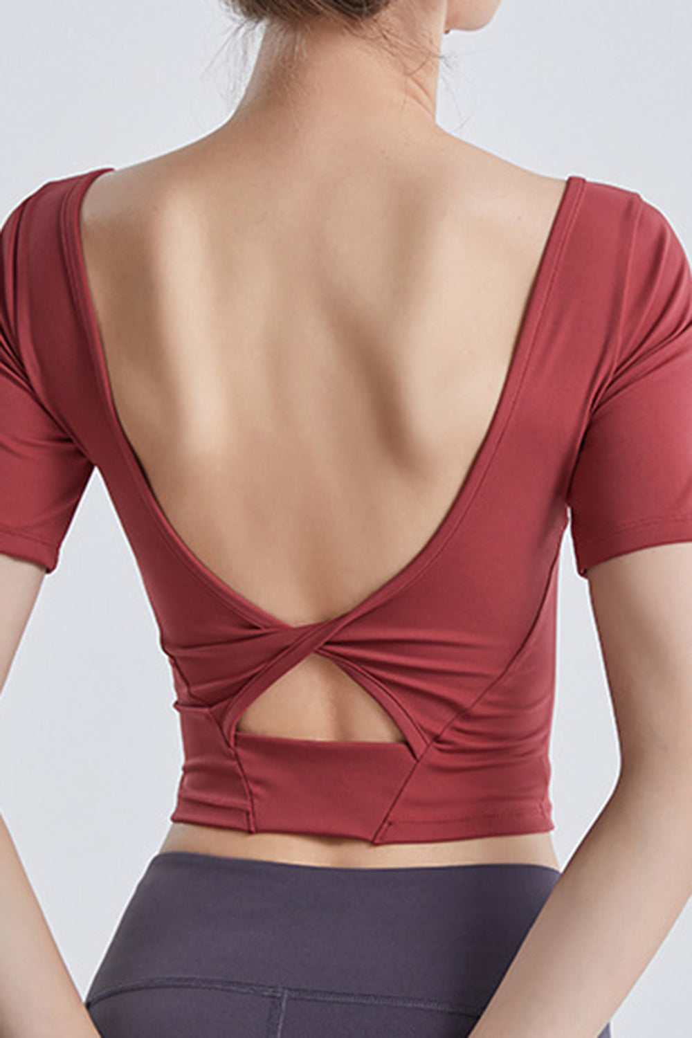 Cutout Backless Round Neck Active T-Shirt  Trendsi   