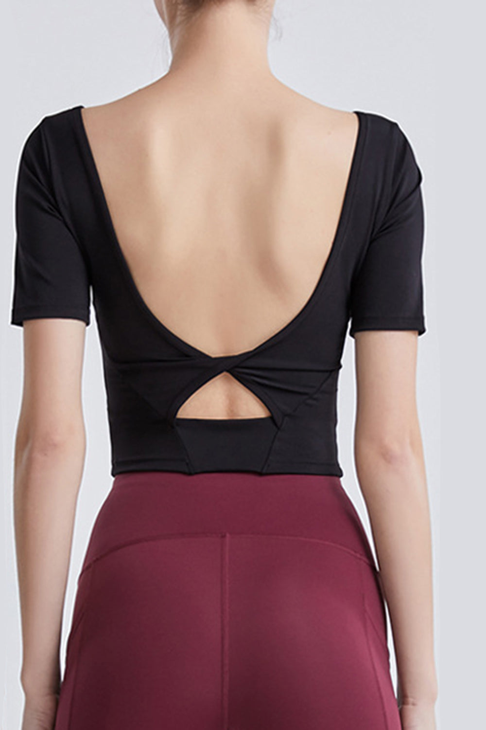 Cutout Backless Round Neck Active T-Shirt  Trendsi   